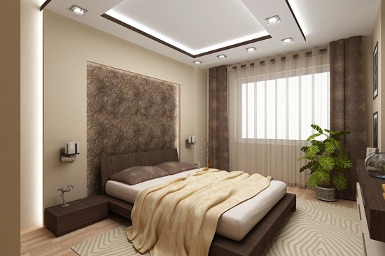 Прямоугольный короб из гипсокартона с точечными светильниками для выделения и декорирования зоны спального места.